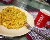 A picture of step 4 of Maggi with lots of veggies.