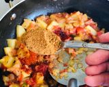 A picture of step 4 of Aloo chana masala.
