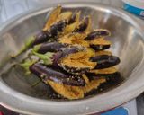 A picture of step 2 of Stuffed Brinjal potatoes in gravy.