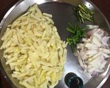 A picture of step 1 of Bengali Aloo Pyaaz Chocchori.