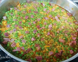 Foto del paso 4 de la receta: Arroz con guisantes y jamón