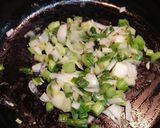 A picture of step 5 of Spring Onion Poriyal/Spring Onion Stir Fry.