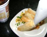 Foto del paso 3 de la receta: Arrolladitos rellenos con dulce hechos con discos de empanadas