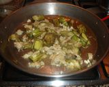 Foto del paso 4 de la receta Paella de alcachofas y bacalao