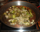 Foto del paso 4 de la receta: Paella de alcachofas y bacalao