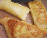 Foto langkah ke 7 dari resep Apple Pie stuffed French Toast.