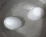 Boil egg and French toast. Breakfast recipe step 1 photo