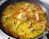 A picture of step 7 of Chicken and Squid Paella.