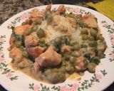 Foto del paso 5 de la receta: Pollo al pimentón con salsa cremosa de verdeo y arvejas y arroz