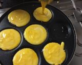 A picture of step 5 of Mango Pancakes with Almonds and Caremal Sauce.