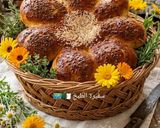 صورة لخطوة 1 من وصفة خبز الربيع على شكل وردة🌺
