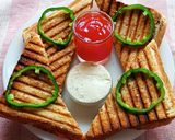 A picture of step 4 of Cheese spread salad grilled sandwich.