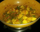 A picture of step 3 of Aalu beens with curd.
