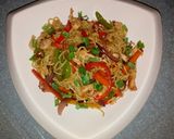 A picture of step 9 of Tricolour chicken stir fried noodles.