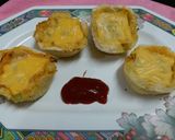 A picture of step 5 of Chicken Egg Cup Pizza.