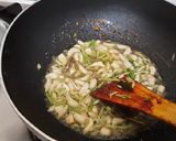 A picture of step 3 of Green garlic, green chilli ginger pickle.
