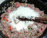 Foto del paso 3 de la receta: Ajíes rellenos de carne y arroz en salsa