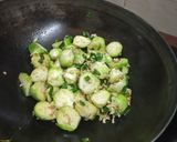 A picture of step 2 of Stir fried brussel sprouts.
