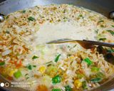 A picture of step 2 of Maggi with lots of veggies.