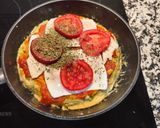 Foto del paso 19 de la receta Tortilla de brócoli con sobre mesa de tomate