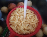 Foto del paso 2 de la receta: Pollo 🐔 con tornillo 🔩 (pasta)