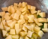A picture of step 3 of Aloo Posto.
