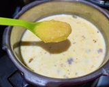 A picture of step 3 of Doodh daliya in pressure cooker (with different toppings).