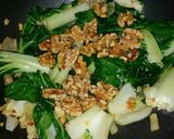 A picture of step 7 of Walnut stir-fry Bok Choy.