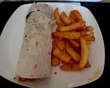 A picture of step 5 of My Marinated Chicken Strips in a wrap Red Hot Sauce.