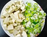 A picture of step 1 of Leek and Sweet Potato Soup.