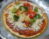 A picture of step 2 of Homemade panner pizza 🍕.