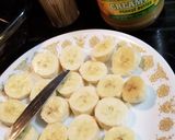 A picture of step 1 of Chocolate Covered Frozen Banana Peanut Butter Sandwiches.