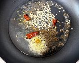 A picture of step 2 of Oats Thatte Idli Upma.