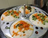 A picture of step 3 of Oats mixed idli batter vegetables Idli Chutney.