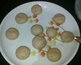 A picture of step 9 of Ashtami special prasaad the puri chana and halwa thali.