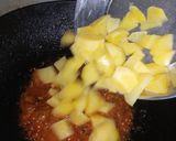 A picture of step 15 of Khatay aloo.