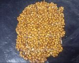 A picture of step 4 of Daliya Chikki / Roasted Puff Chana Chikki.