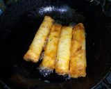 A picture of step 13 of Chicken Roll.