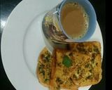 A picture of step 5 of Qeema Omelette Toast😋🍞☕.