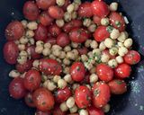A picture of step 4 of Roasted Tofu with Chickpeas, Tomatoes and Tahini.