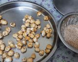 A picture of step 3 of Makhana revdl sesame seeds coated (til).