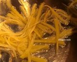 A picture of step 4 of Stir-Fried Pineapple with Shredded Ginger and Wood Ear Mushrooms.