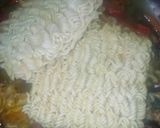 A picture of step 2 of Noodles with veggies.