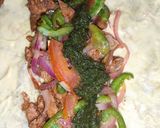 A picture of step 14 of Chicken Frankie Roll.