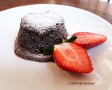Foto del passaggio 6 della ricetta Tortino al cioccolato dal cuore morbido fondente