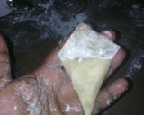 A picture of step 10 of Scramble egg filled samosas.
