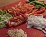 A picture of step 1 of Chicken Paella with Peppers.