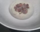 A picture of step 2 of Kande (onion) pohe.