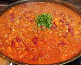 Foto del paso 4 de la receta: Calabacín relleno de chili con carne y queso