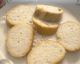Foto del paso 3 de la receta: Torrijas de coco y naranja al horno